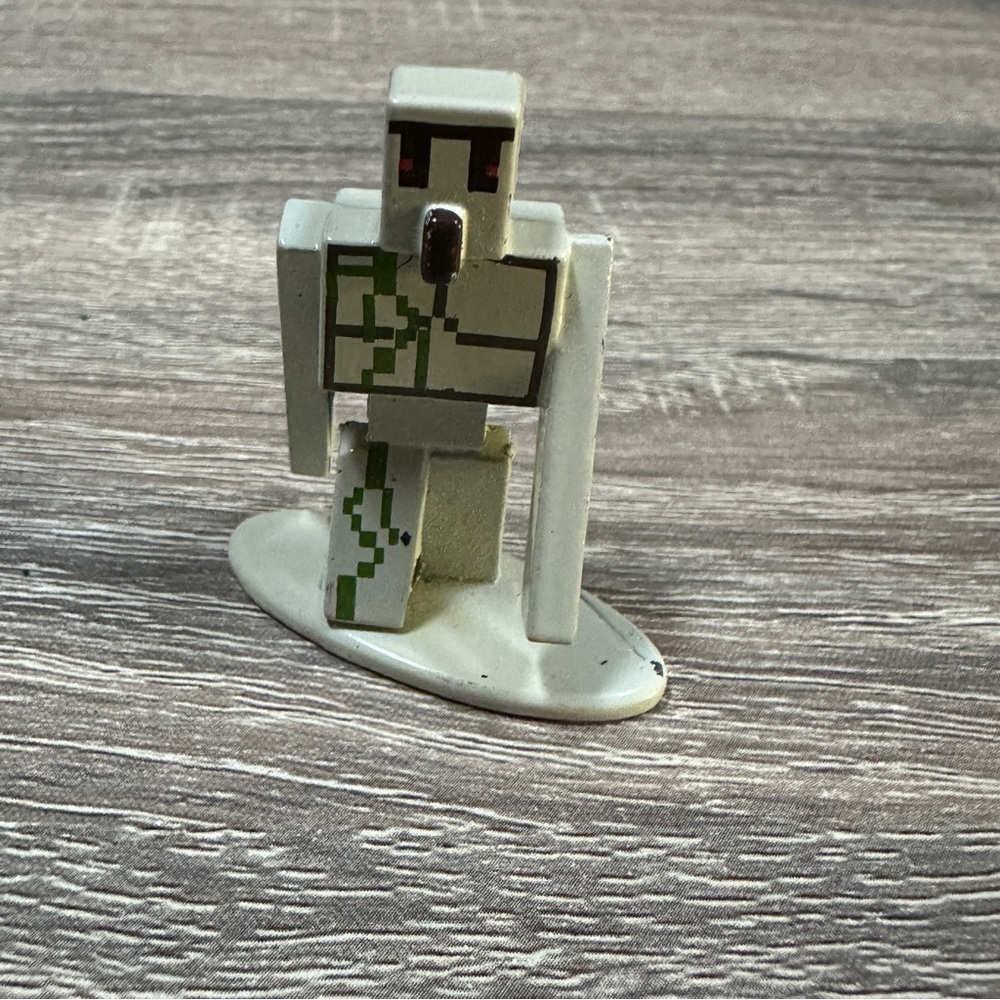 Action‎ Figure with Green and White Design